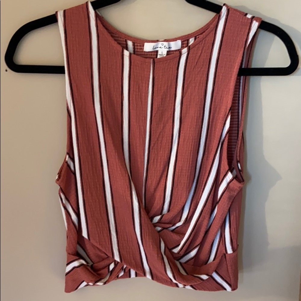 Orange, white, and black striped tank.